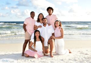Family portrait posed on beach