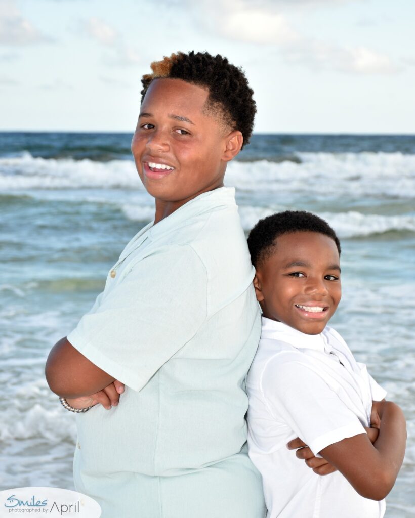 Brothers smiling at camera