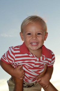 Happy little boy in one of our Destin beach photos