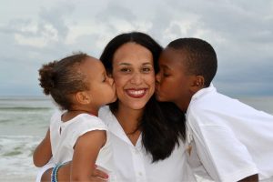 Kids posing with woman