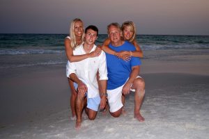 Two couples in similarly colored attire