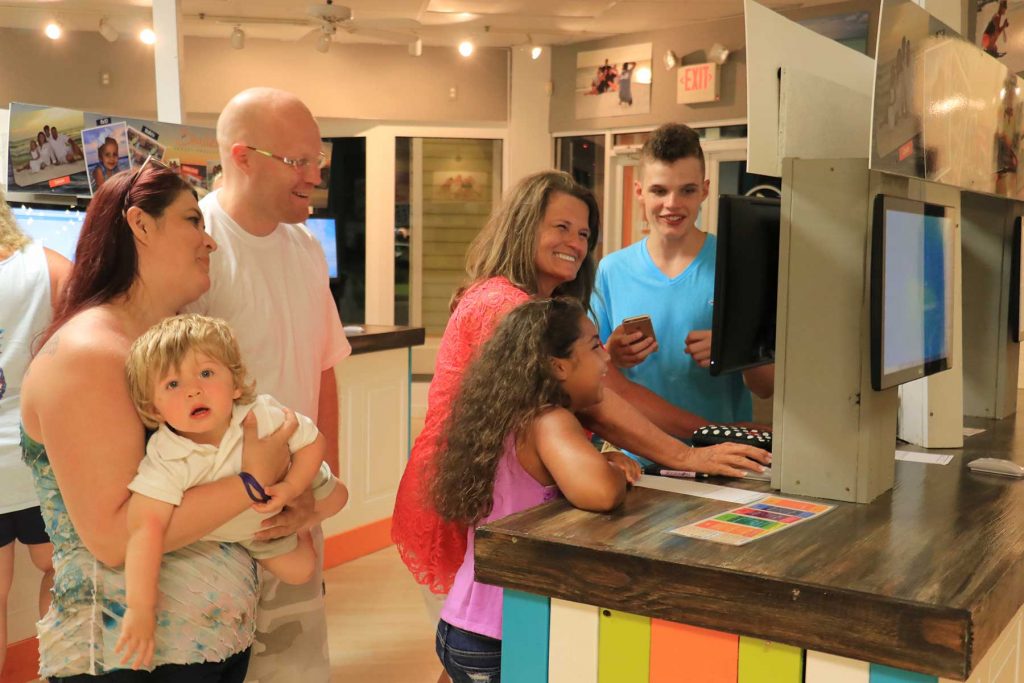 happy family choosing their photos