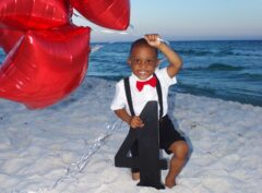 Little boy with balloons in special occastion photo