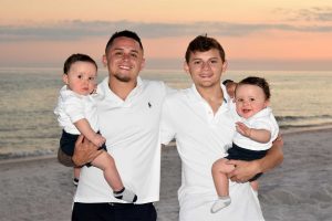 family beach photo with babies