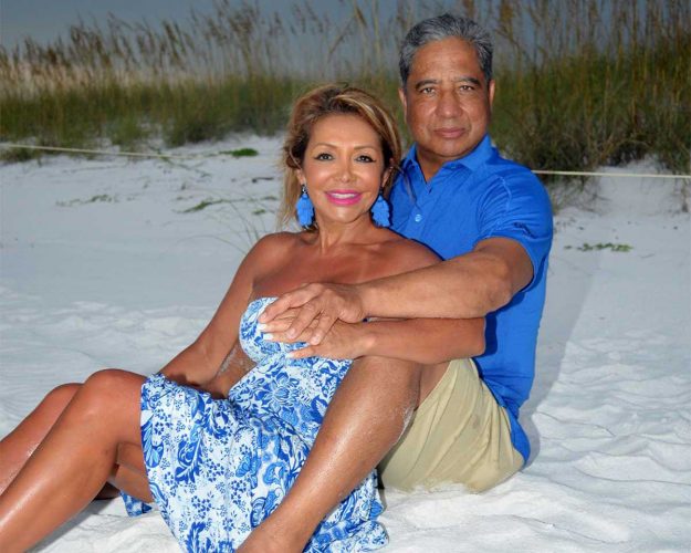 couple posing on the sand