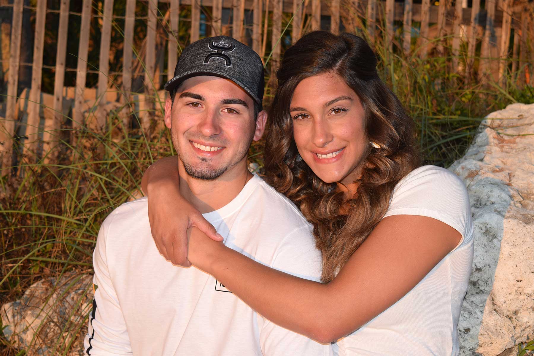 couple smiling for photographer