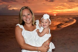 mother and child sunset beach photo