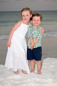 How to pose children for beach photos.