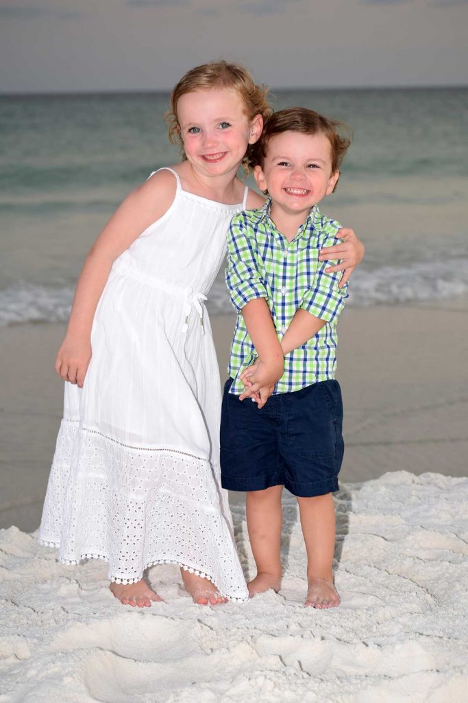 How to pose children for beach photos.