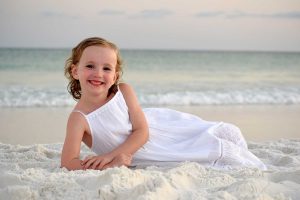 Little girl posing for sunset photo