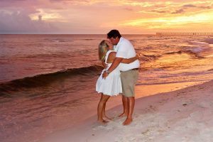 couple kissing on the beach