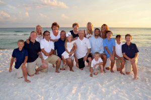 Family photographer in Panama City Beach captured at sunset.