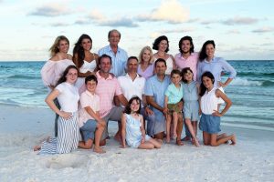 Large group smiling in beach photo