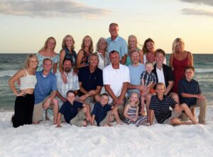 Large group photo at sunset in Panama City Beach