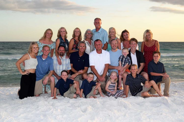 Large group photo at sunset in Panama City Beach