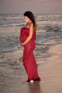 A glowing mother amidst her pregancy phootshoot in PCB.