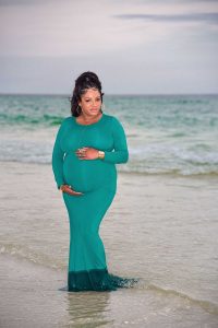 Maternity photos taken on the beach.