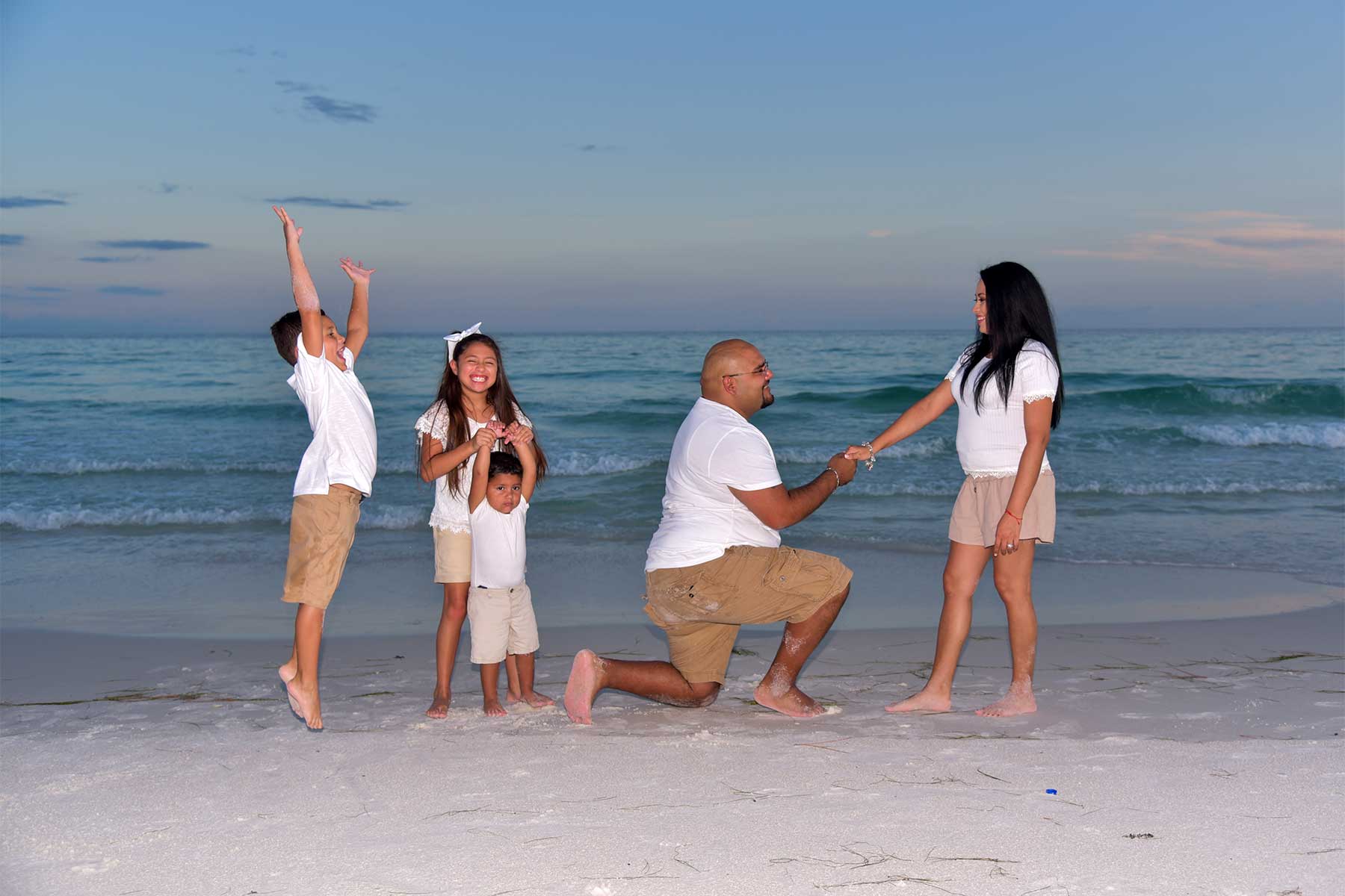 Getting the family invloved during sunset portraits in Panama City Beach, FL is enjoyable for everyone. 