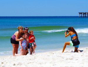 April taking beach photo of family