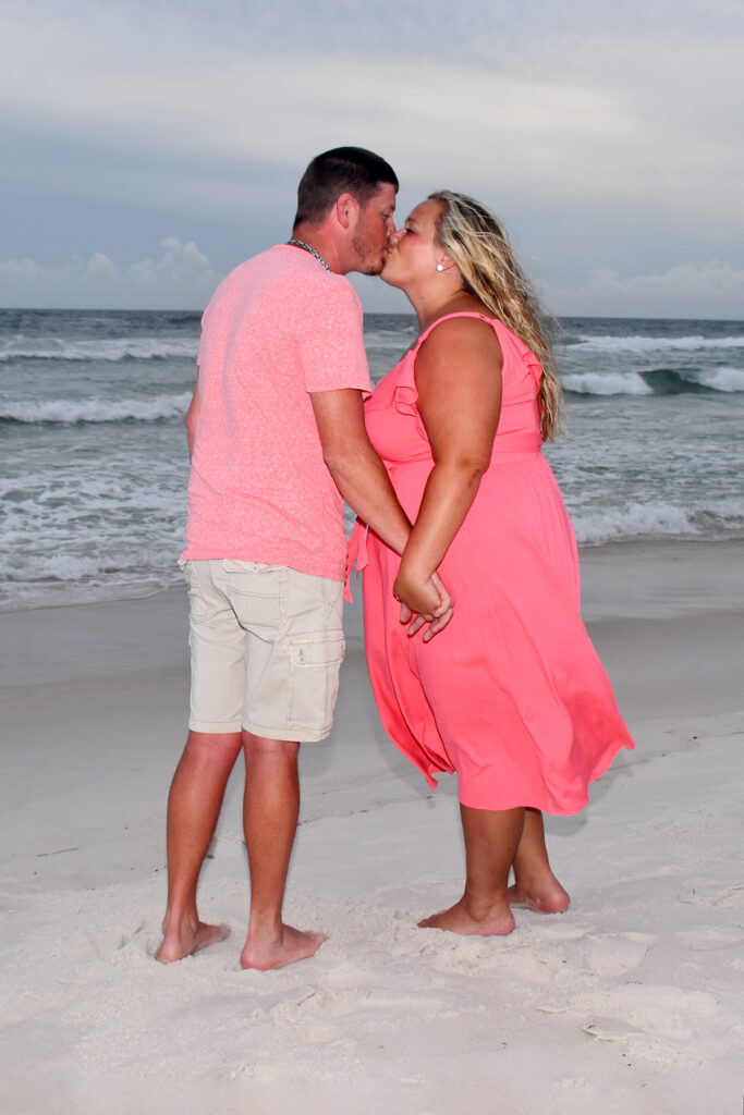 couple kissing on the beach