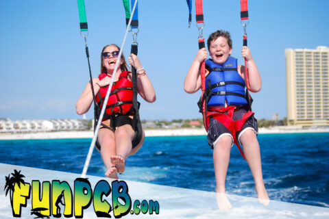 happy family parasailing