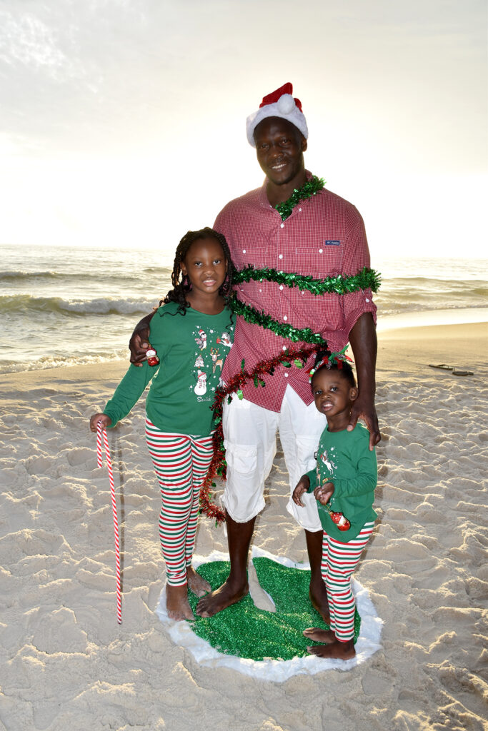 Family Christmas photo on Panama City Beach, Florida.