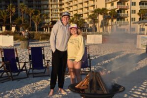 couple photo at a beach bonfire