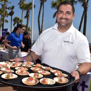 Food event sample photo - man holding tray of food