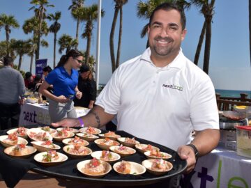 Food event sample photo - man holding tray of food