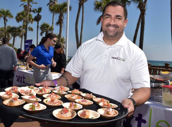 Food event sample photo - man holding tray of food