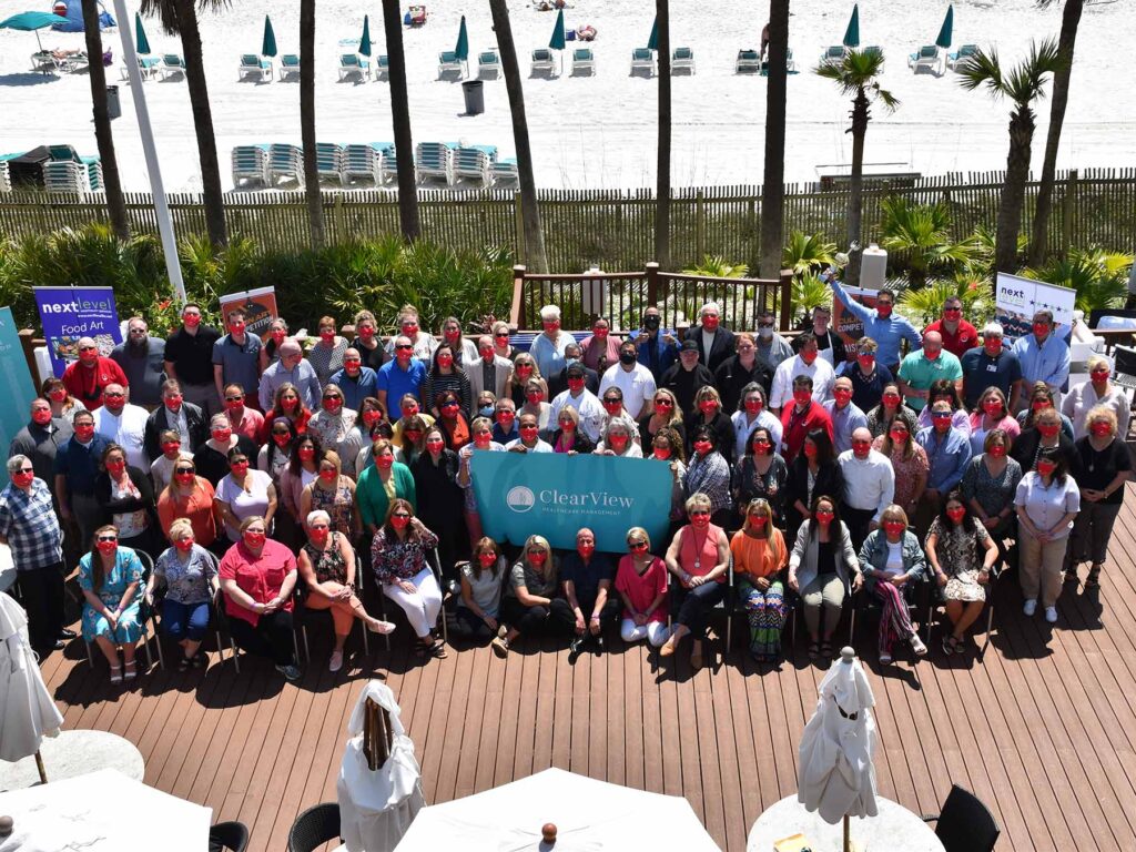 Very large group photo at a corporate event.